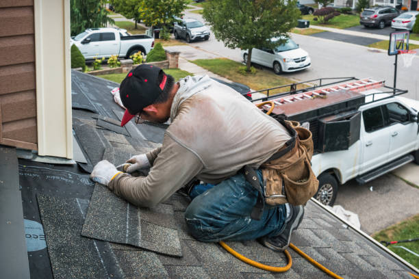 Professional Roofing technician working in Grissom Arb, IN